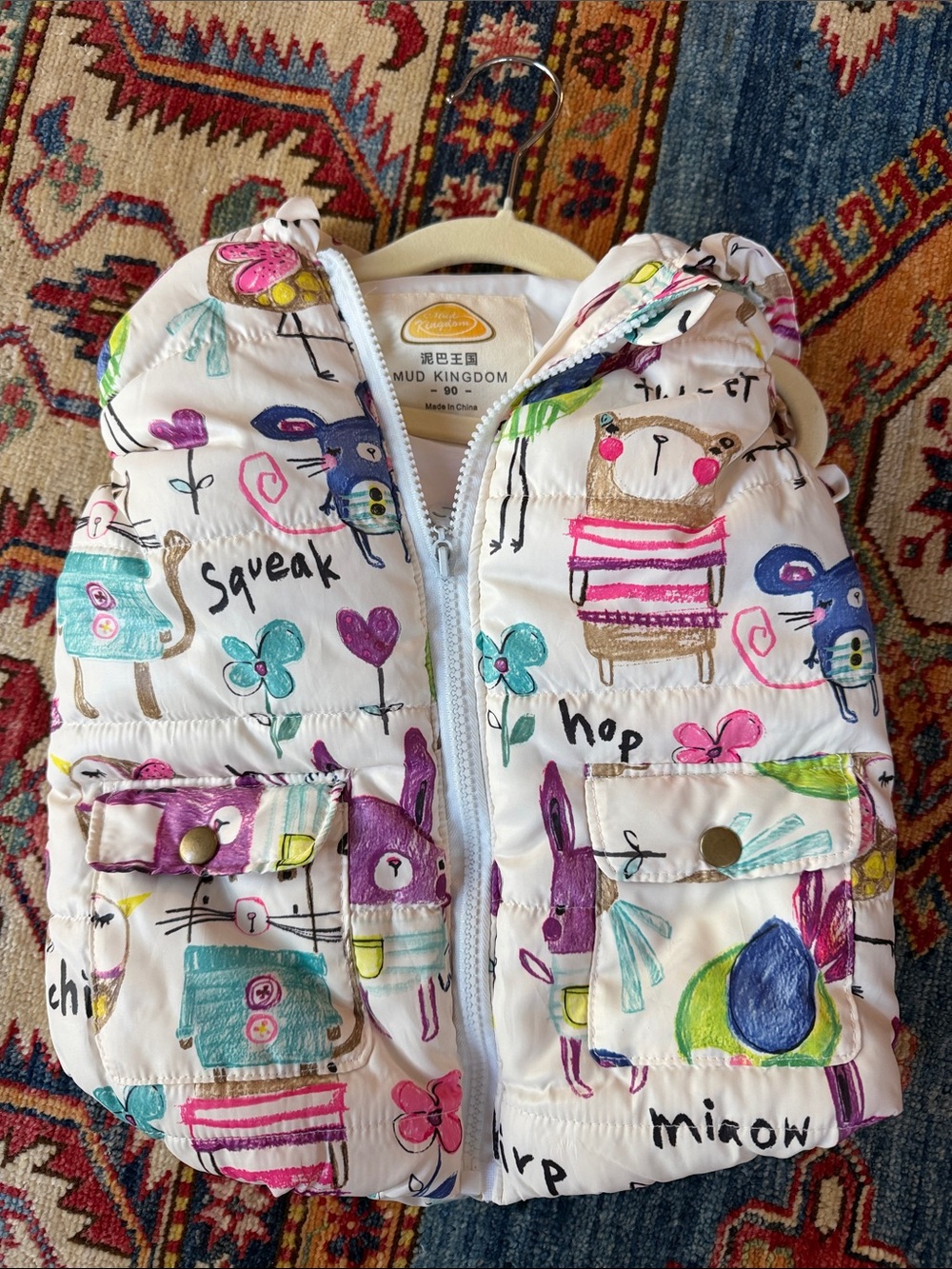 Mud Kingdom Kids' Cream Puffer Vest with Colorful Animal Print